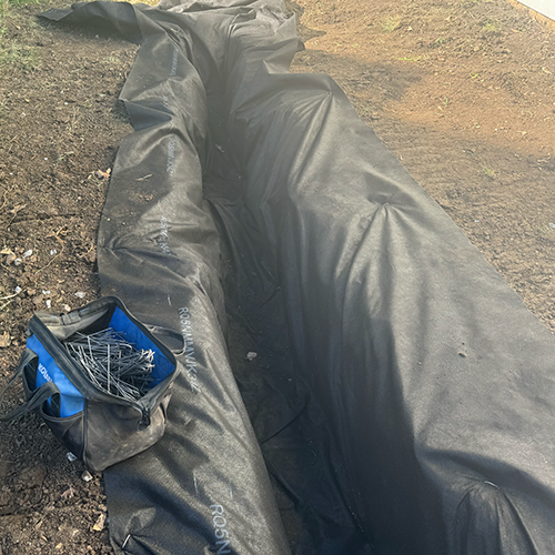 Filter fabric laid in trench